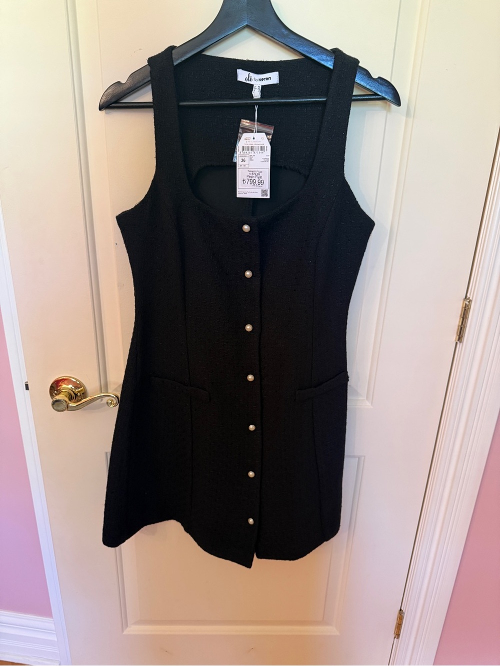 Sleeveless Black Button-Front Dress with Pearl Buttons